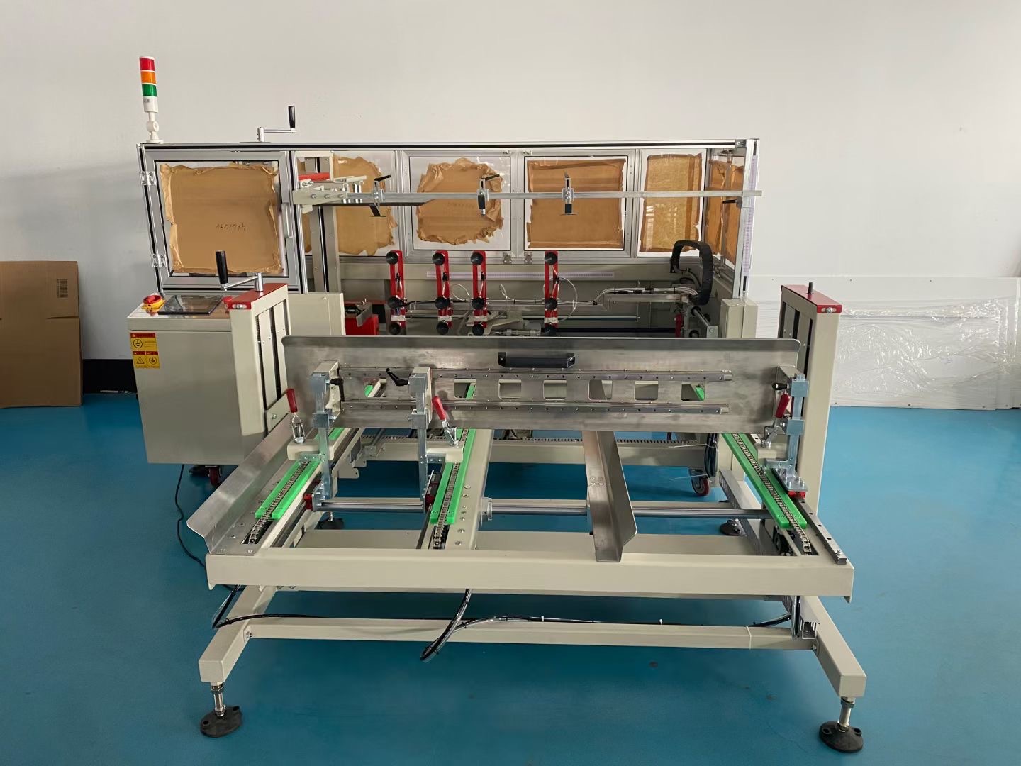 半自动开箱机-自动输送储料箱开箱机-开箱机检修