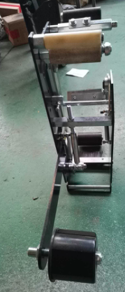 封箱机头-贴带器原理